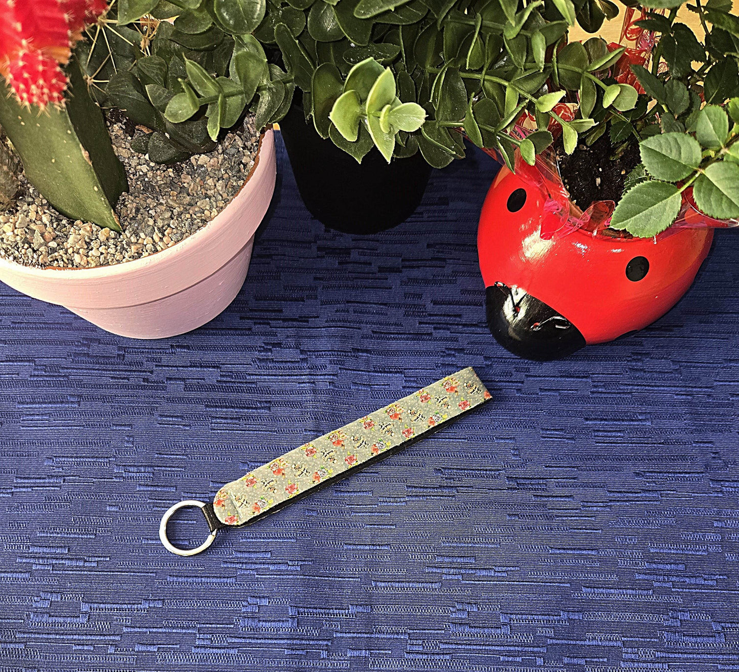 Alice Inspired Wristlet Key Chain (Multiple Designs Available) - Vegas Custom Creations