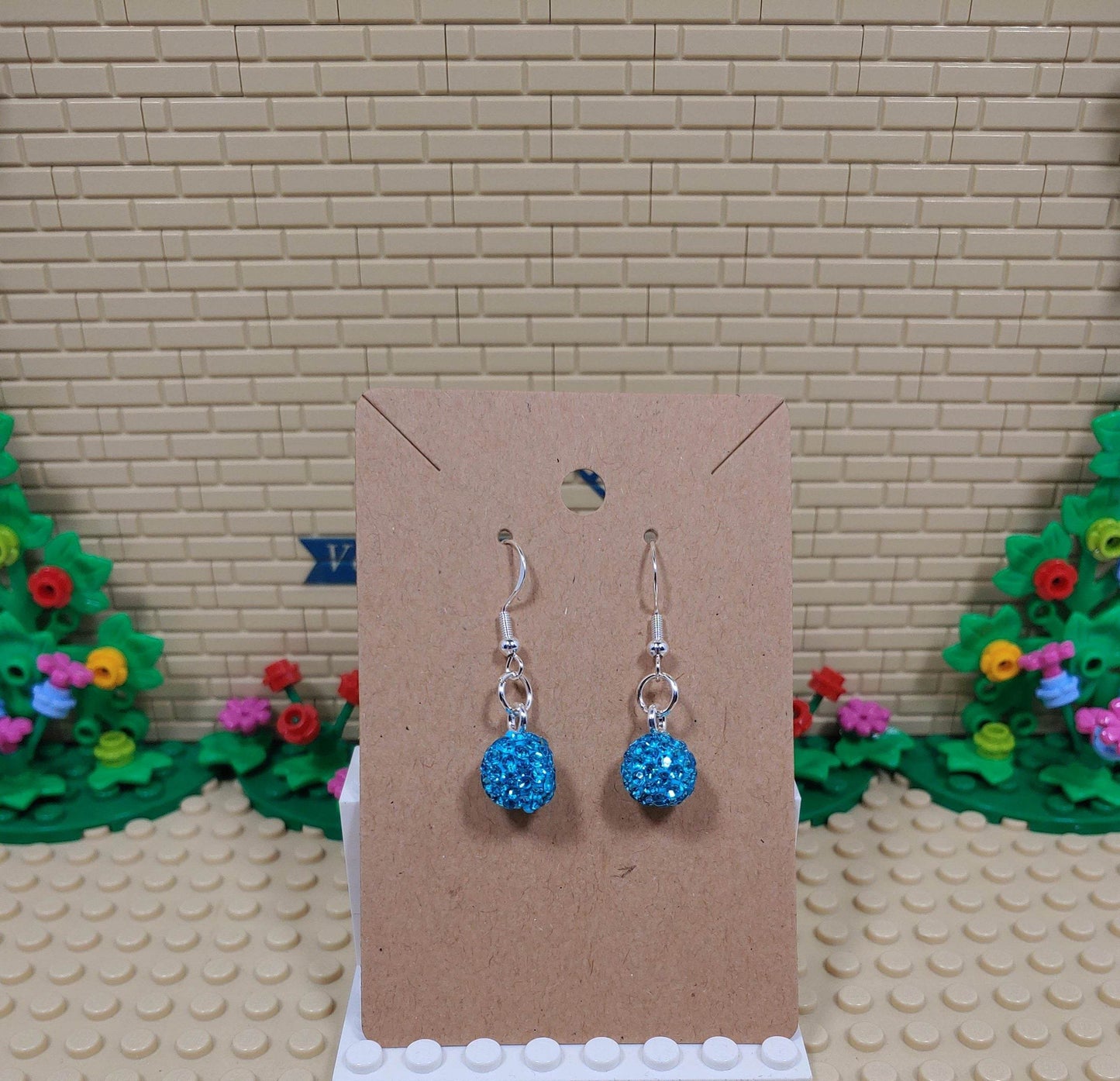 Beautiful Light Blue Glitter Ball Dangling Silver Plated Hook Earrings - Vegas Custom Creations